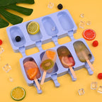 WMKGG Popsicle Silicone Molds Set, 2 PCS Ice Cream Molds with 50 Wooden Sticks for Cake Pop, Ice Pop, Cakesicles (Standard Size/Blue)