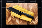 DURA LIVING Santoku Knife - 7 Inch Black Nonstick Titanium Plated Stainless Steel Ultra Sharp Blade, With Ergonomic Comfort Grip Handle Asian Chef's Knife, With Matching Sheath