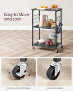VASAGLE Kitchen Shelf on Wheels, Serving Cart with 3 Shelves, Kitchen Cart, Microwave Shelf, for Mini Oven, Toaster, with 6 Hooks, Industrial Stylee, Ebonized Oak Finish and Black UKKS060B42