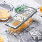LHS Mandoline Slicer, 4 Sharp Stainless Steel Blades with Food Storage Container — Kitchen Tools for Cheese, Chocolate, Vegetables& Fruits - Dishwasher Safe (grey)